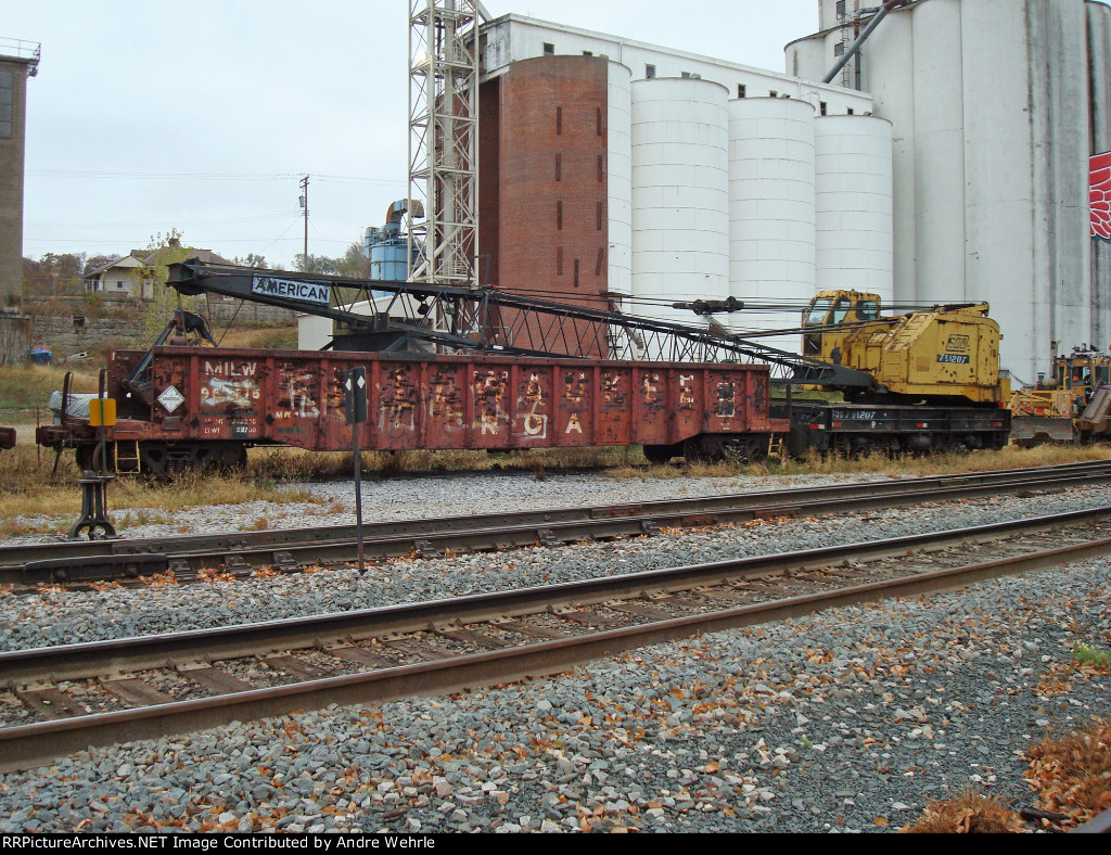 Soo American crane with Milwaukee Road MoW gondola